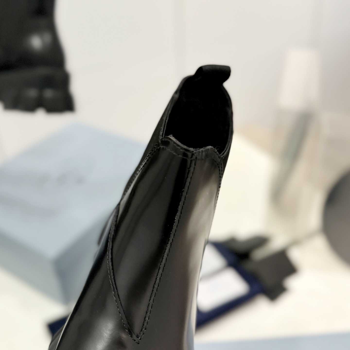 Prada Moonlith Brushed Leather Chelsea Boots - FashionPlug