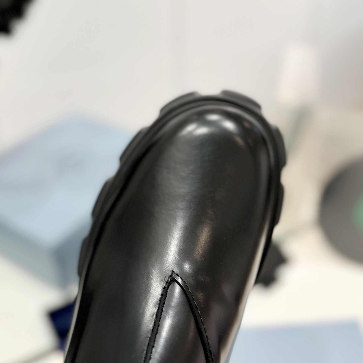 Prada Moonlith Brushed Leather Chelsea Boots - FashionPlug
