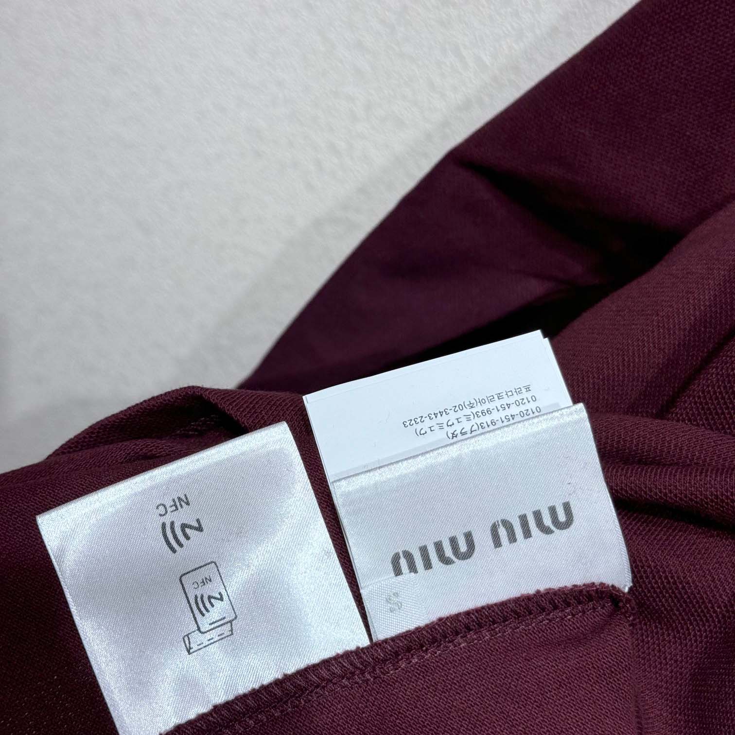 Miu Miu Jersey Polo Shirt - FashionPlug