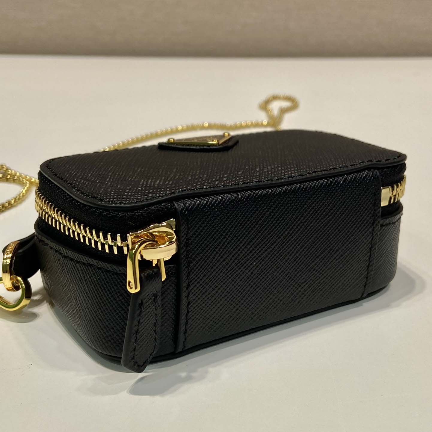 Prada Saffiano Leather Mini-pouch - FashionPlug