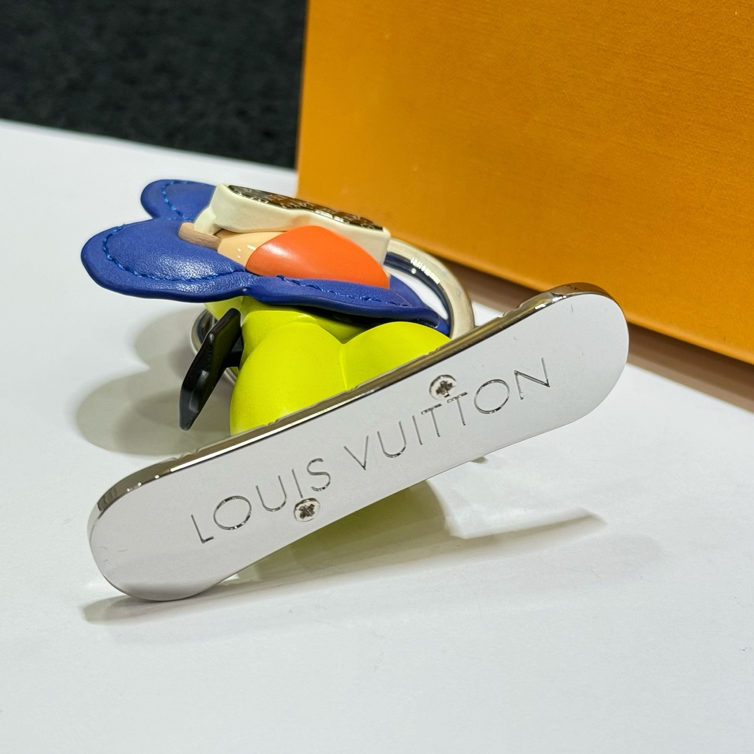 Louis Vuitton Snowboard Vivienne Bag Charm - FashionPlug