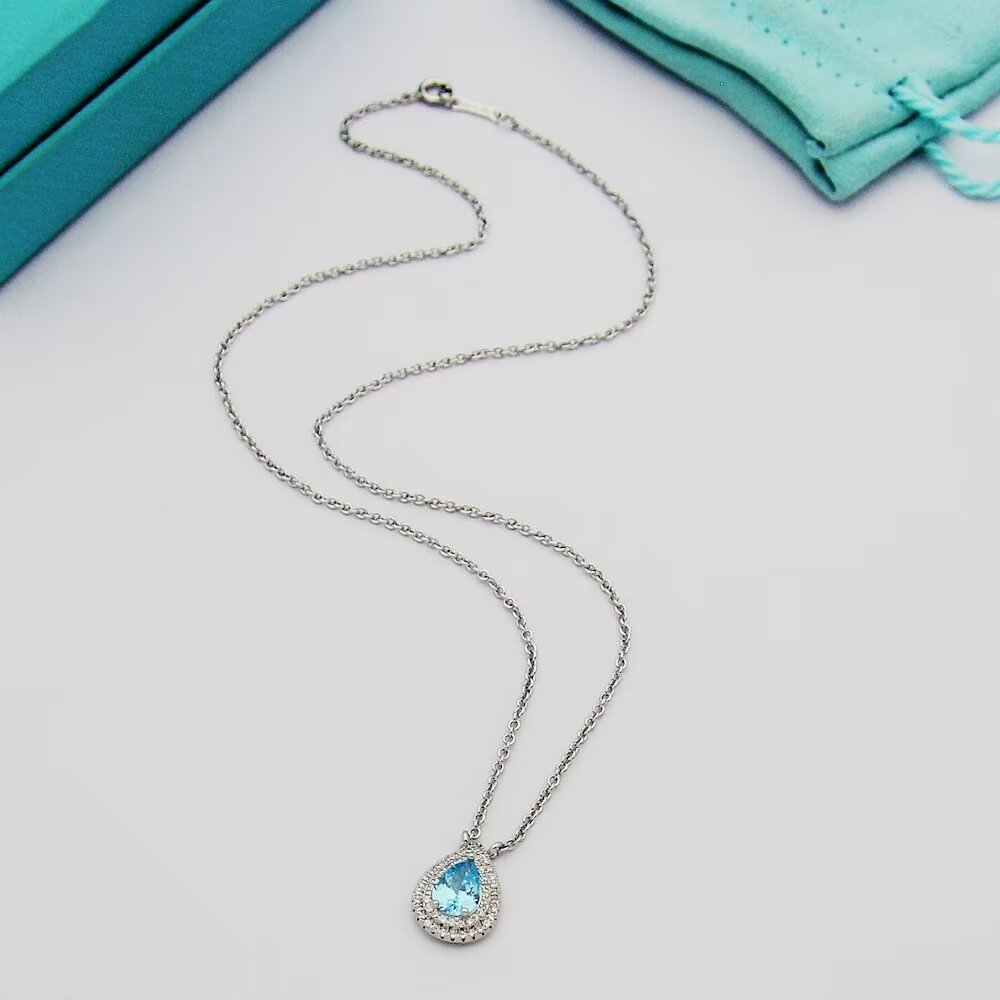Tiffany & Co. Aquamarine and Diamond Pendant - FashionPlug