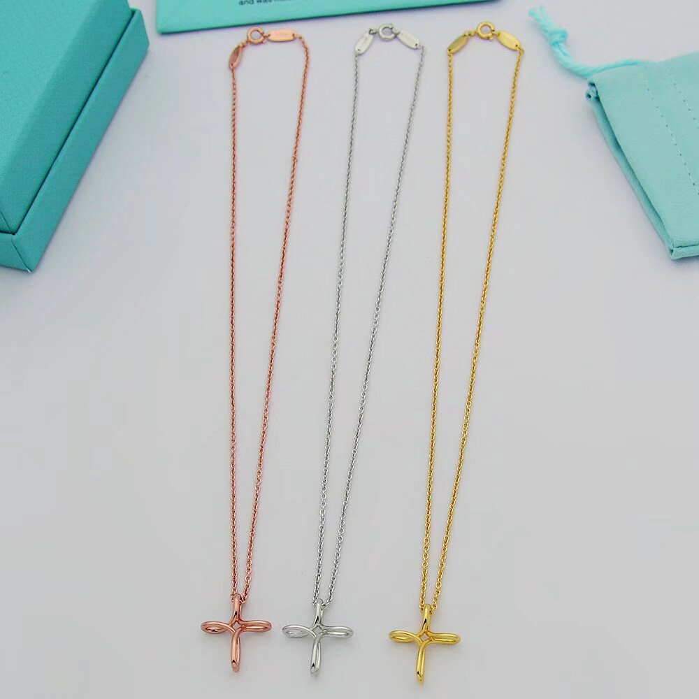 Tiffany & Co. Infinity Cross Pendant - FashionPlug
