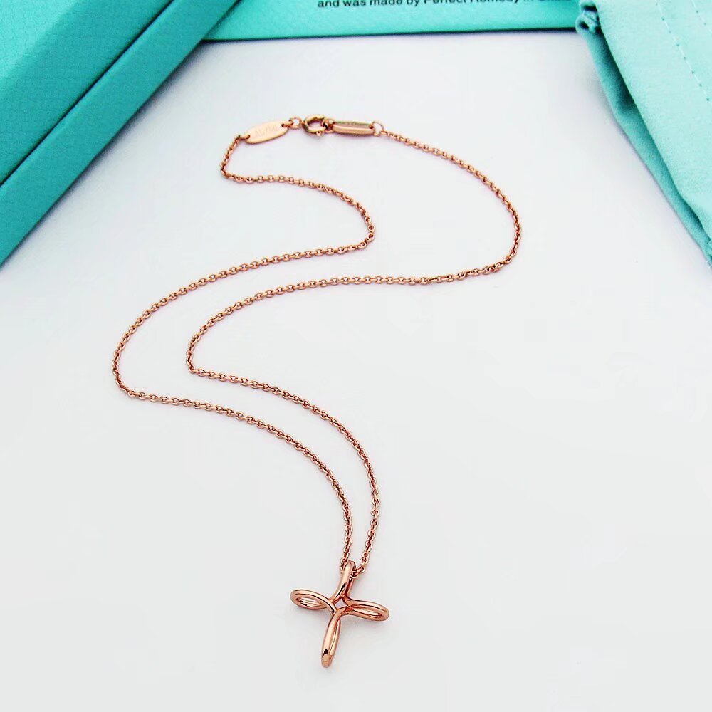Tiffany & Co. Infinity Cross Pendant - FashionPlug