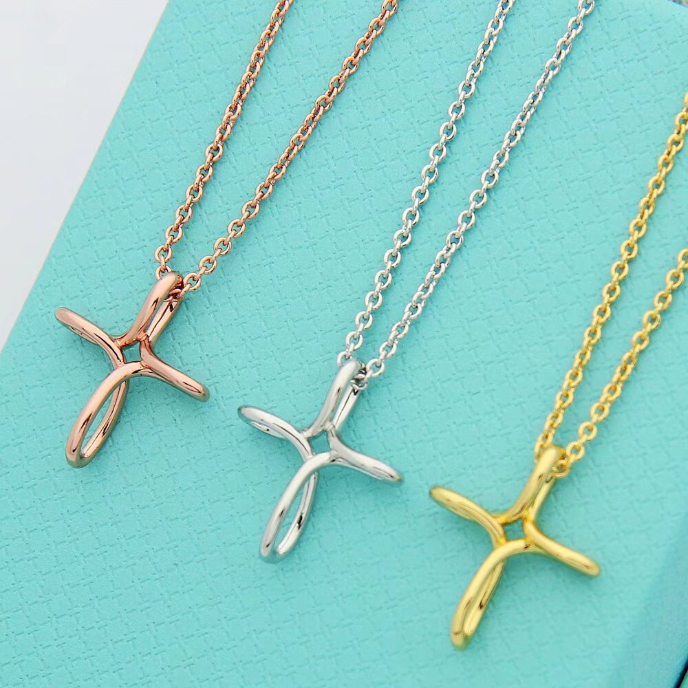 Tiffany & Co. Infinity Cross Pendant - FashionPlug