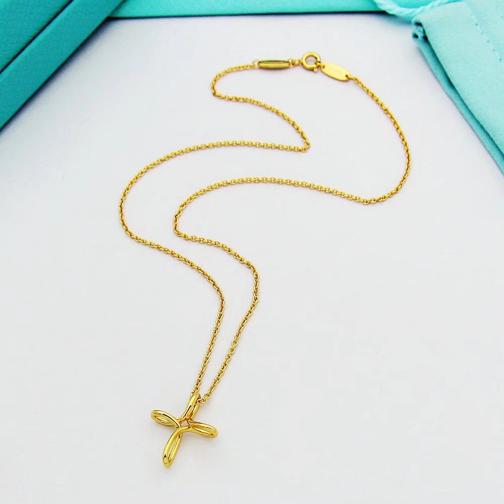 Tiffany & Co. Infinity Cross Pendant - FashionPlug