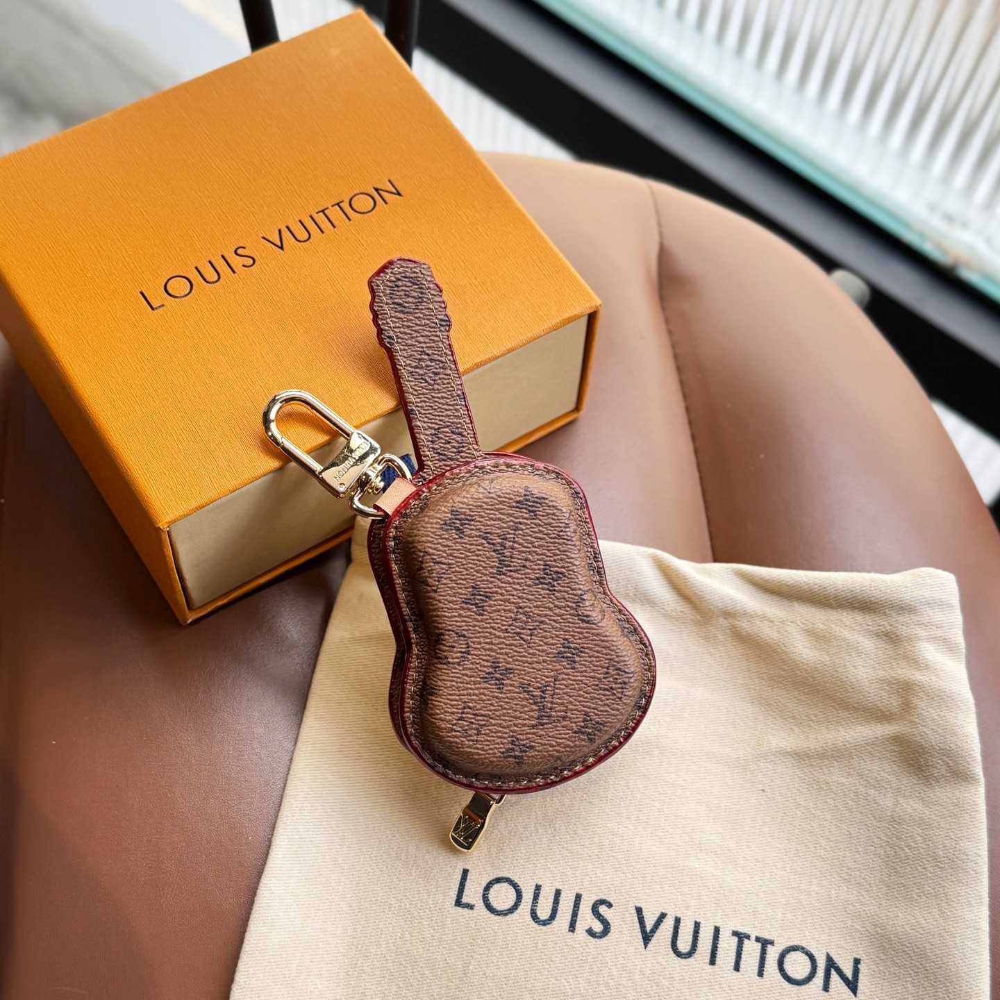 Louis Vuitton Guitar Pouch Bag Charm   M02032 - FashionPlug