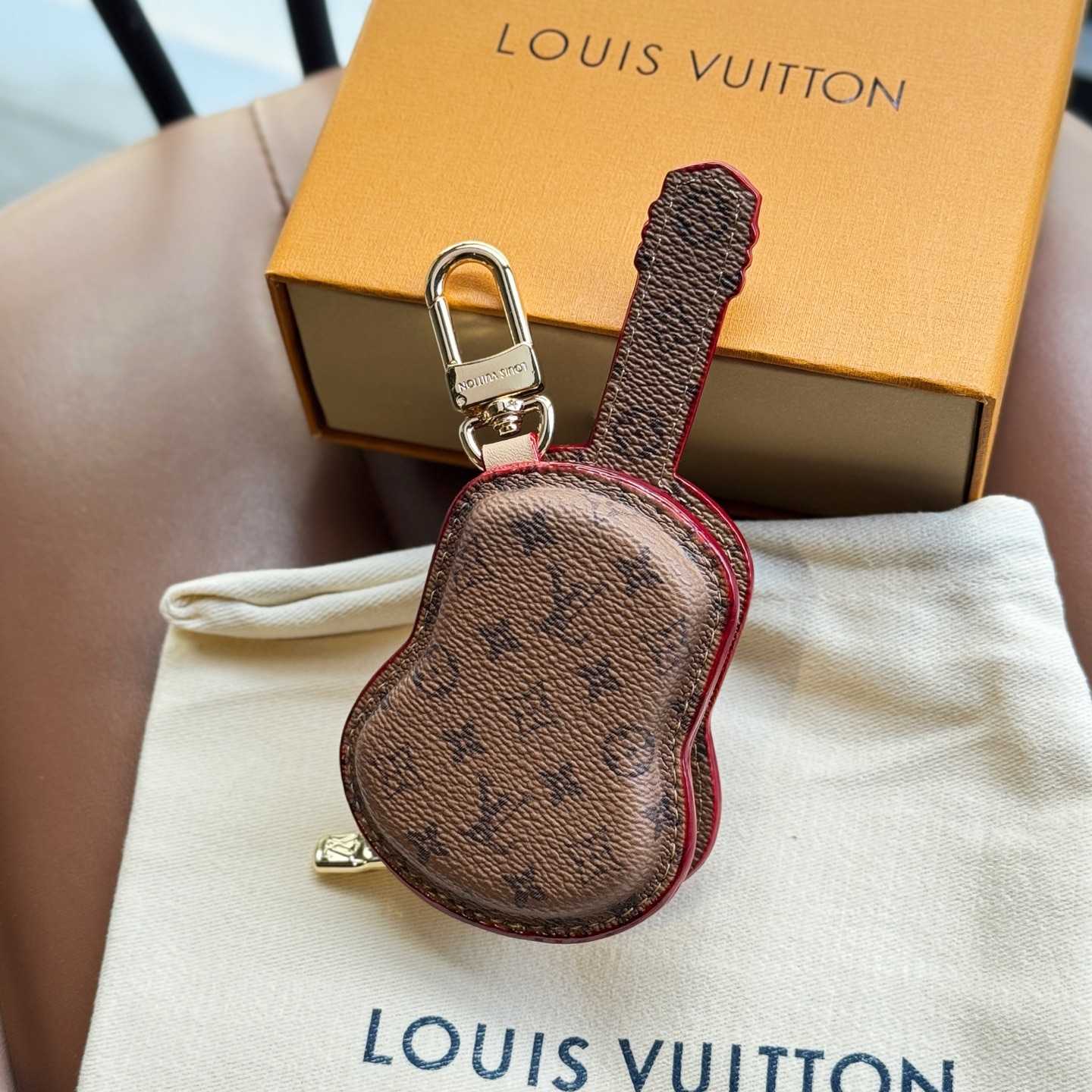 Louis Vuitton Guitar Pouch Bag Charm   M02032 - FashionPlug