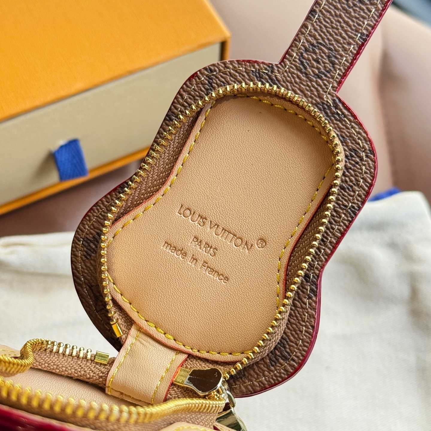 Louis Vuitton Guitar Pouch Bag Charm   M02032 - FashionPlug