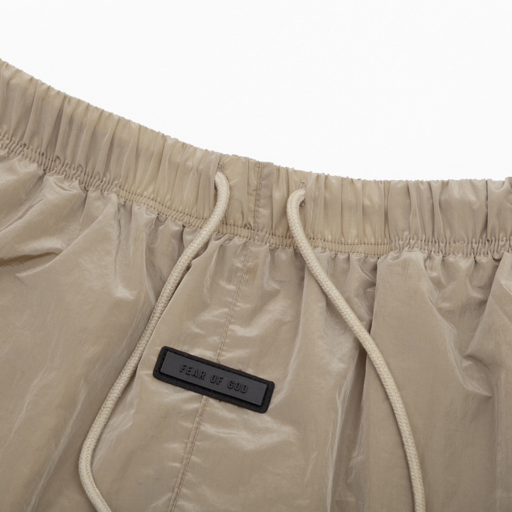 Fear of God Essentials Crinkle Nylon Running Short - FashionPlug
