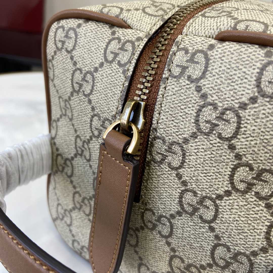 Gucci GG Emblem Medium Toiletry Case - FashionPlug