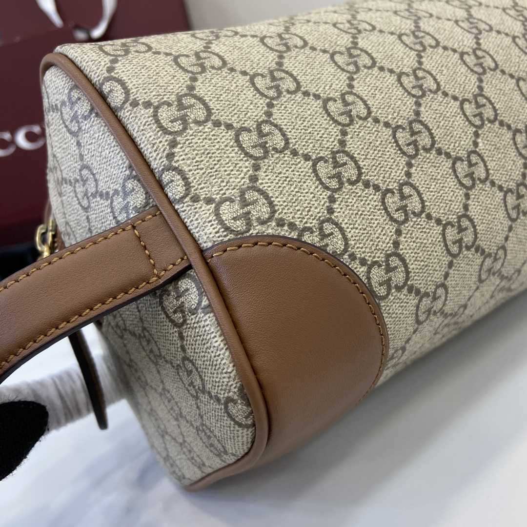 Gucci GG Emblem Medium Toiletry Case - FashionPlug