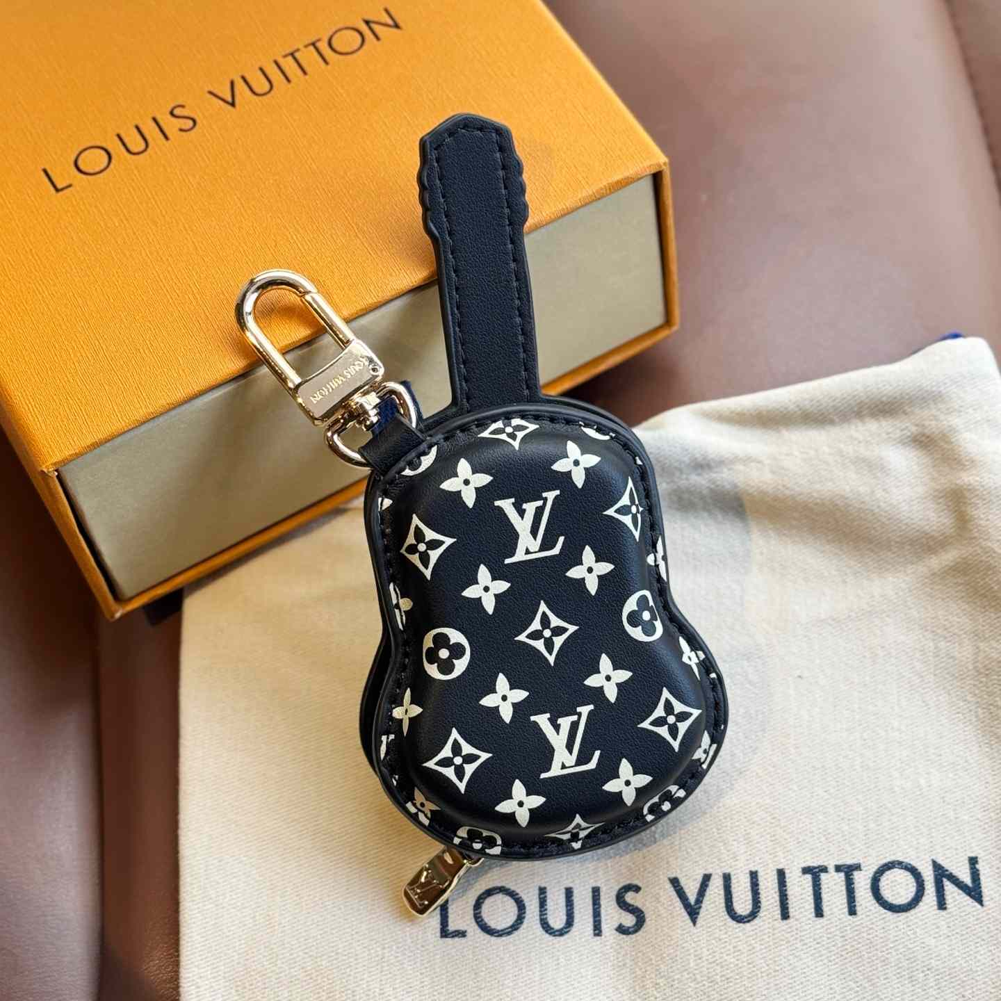 Louis Vuitton Guitar Pouch Bag Charm   M02032 - FashionPlug