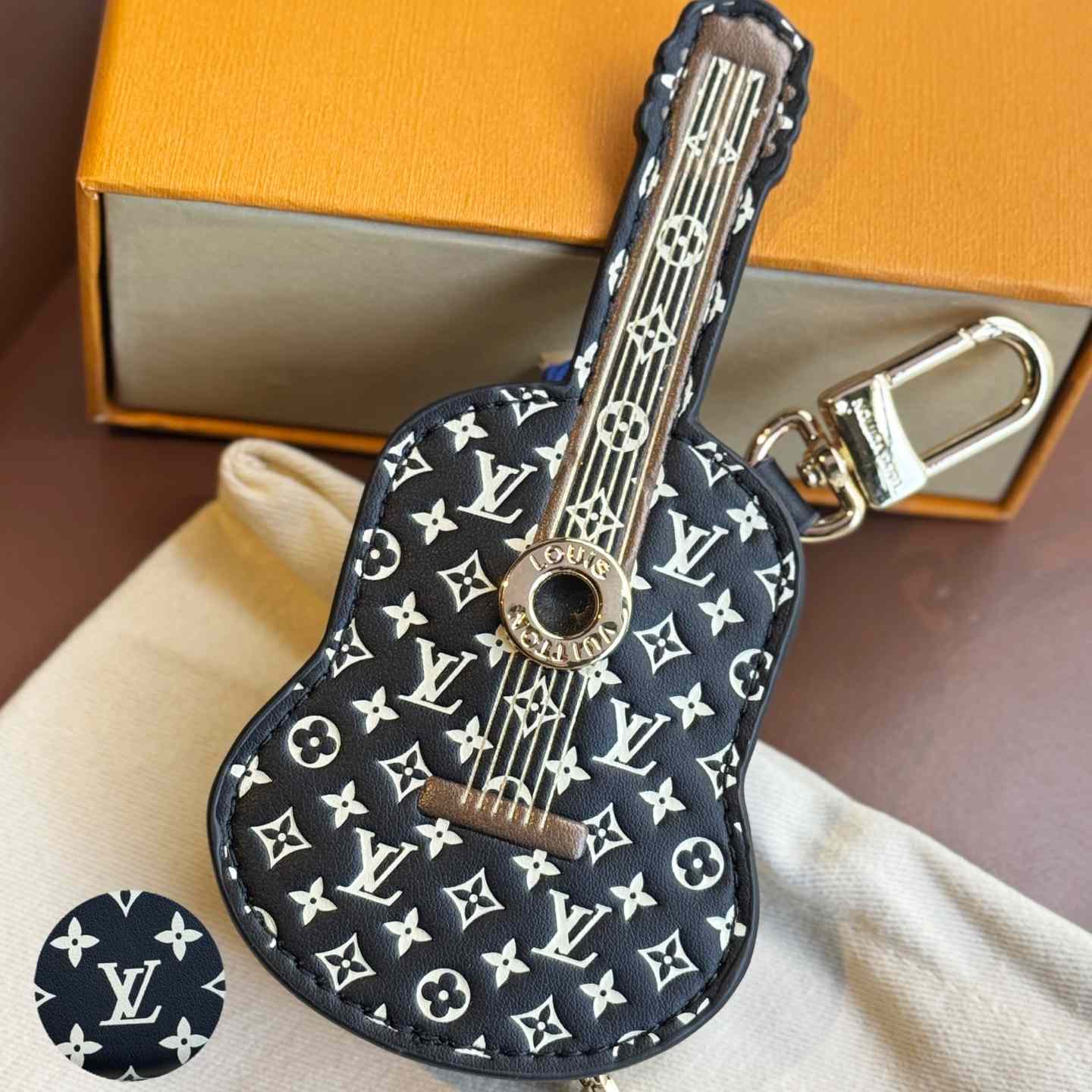 Louis Vuitton Guitar Pouch Bag Charm   M02032 - FashionPlug