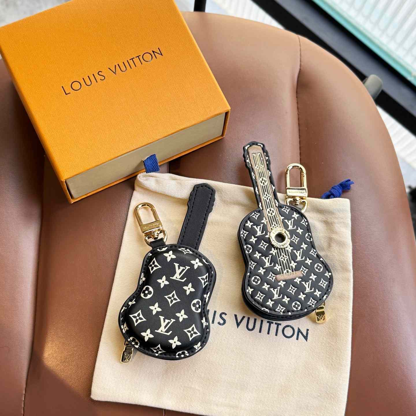 Louis Vuitton Guitar Pouch Bag Charm   M02032 - FashionPlug
