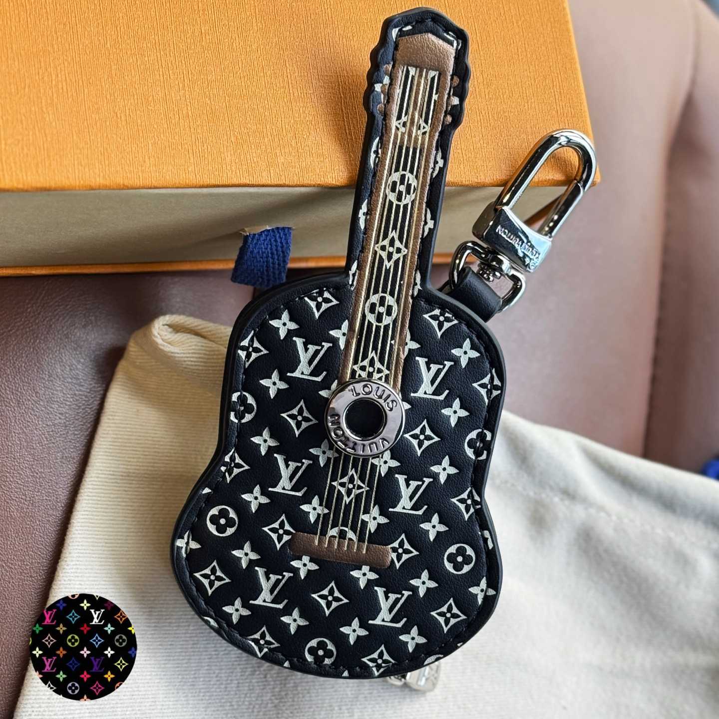 Louis Vuitton Guitar Pouch Bag Charm   M02032 - FashionPlug