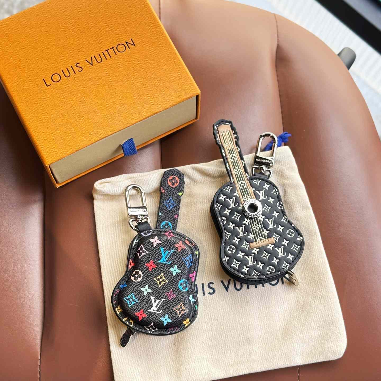 Louis Vuitton Guitar Pouch Bag Charm   M02032 - FashionPlug