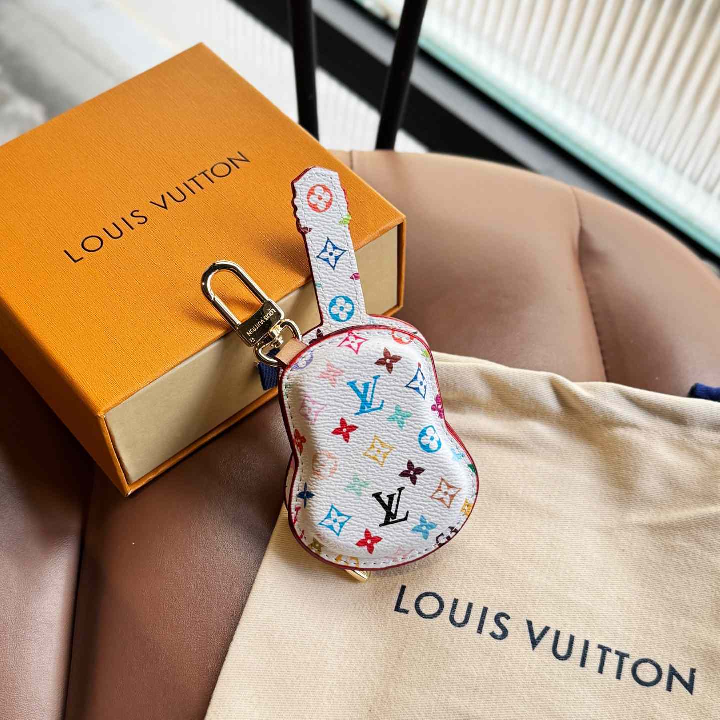 Louis Vuitton Guitar Pouch Bag Charm   M02032 - FashionPlug