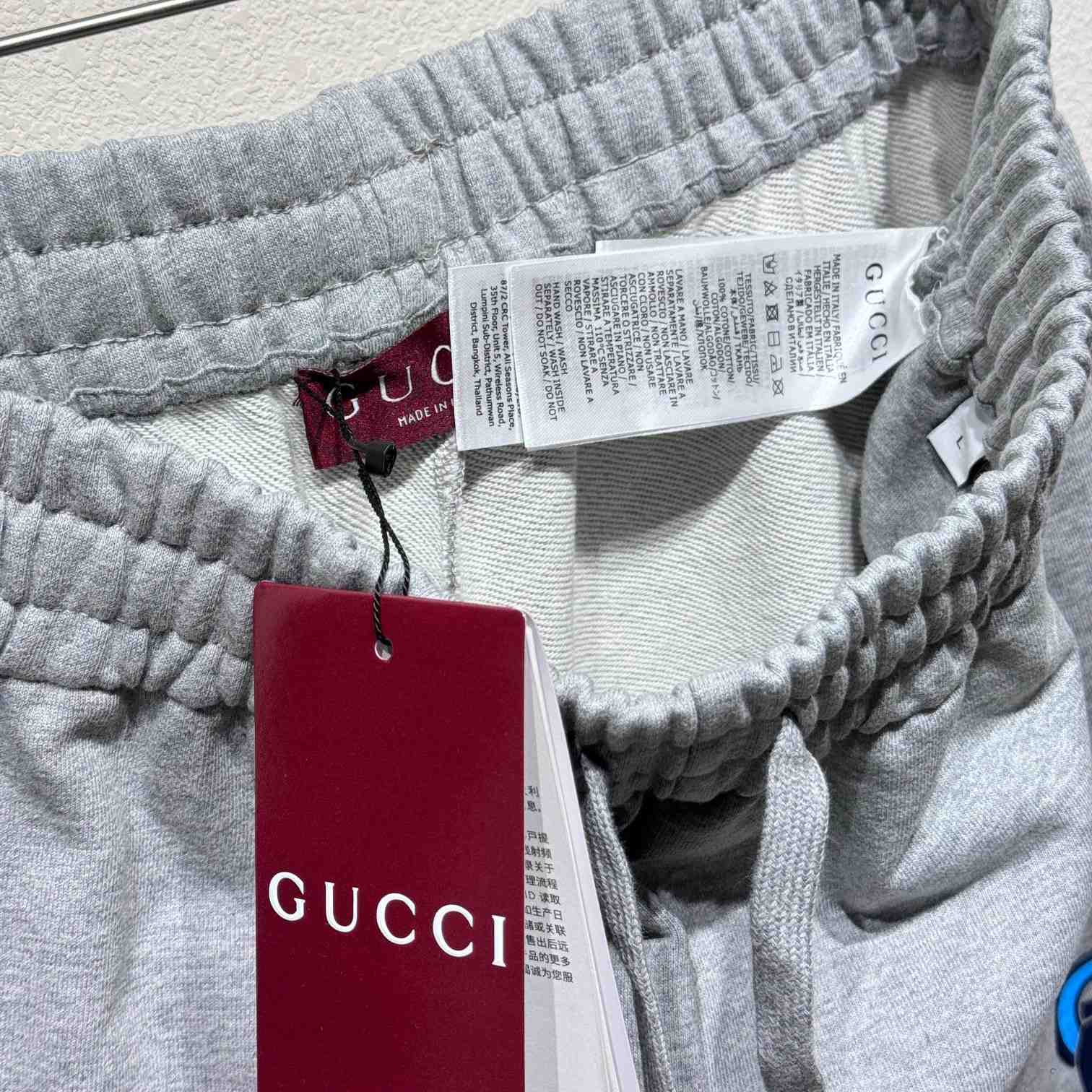 Gucci Printed Sweatpants - FashionPlug