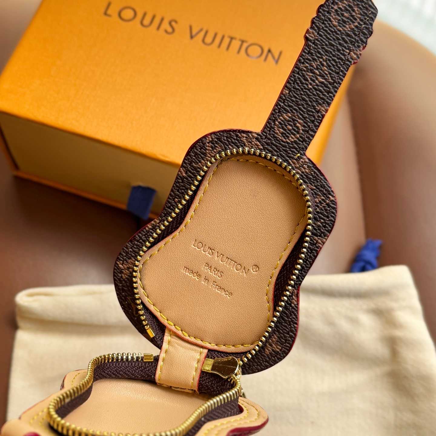 Louis Vuitton Guitar Pouch Bag Charm   M02032 - FashionPlug