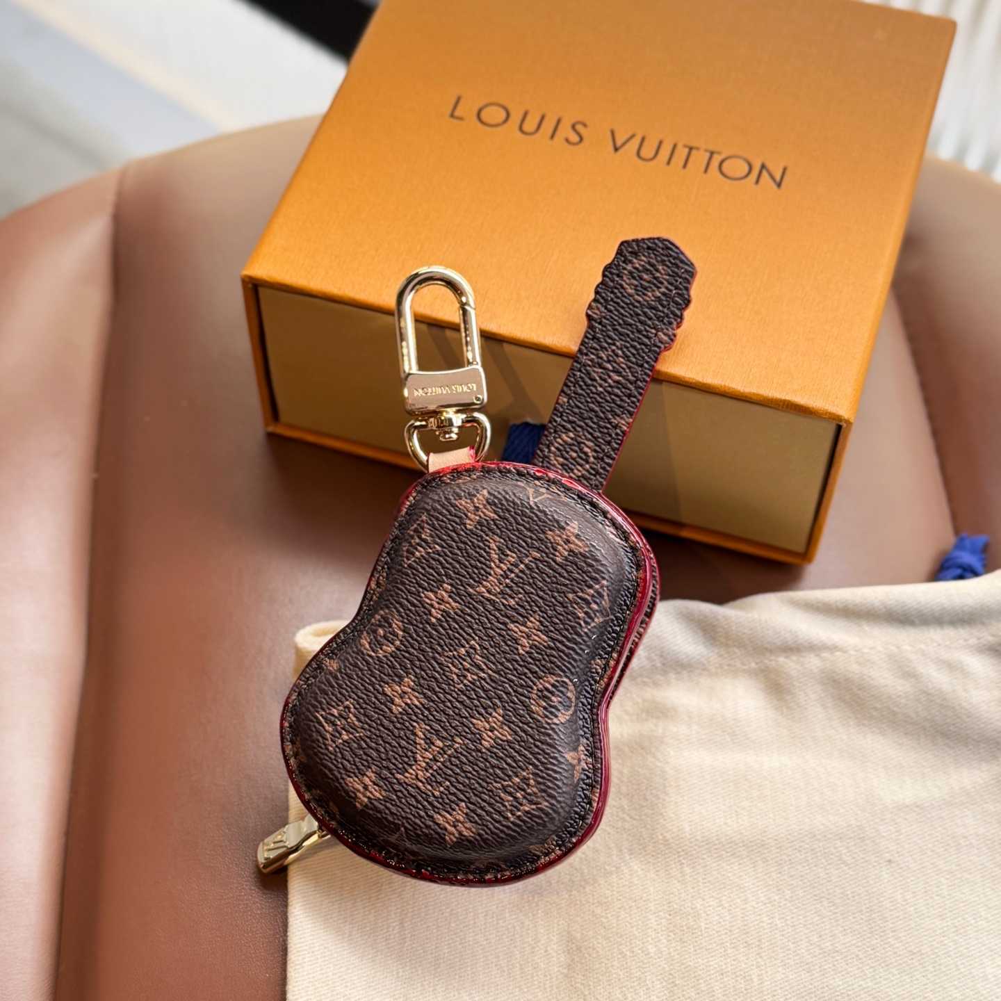 Louis Vuitton Guitar Pouch Bag Charm   M02032 - FashionPlug