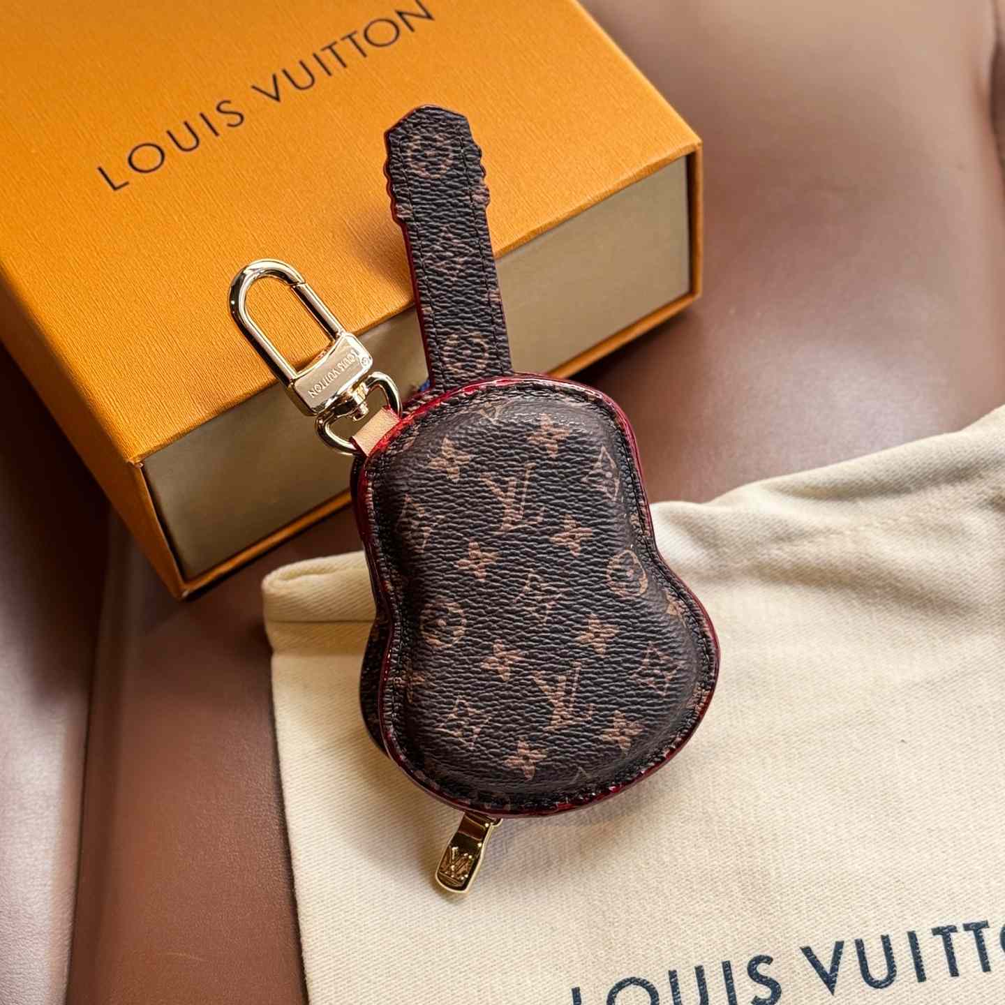 Louis Vuitton Guitar Pouch Bag Charm   M02032 - FashionPlug