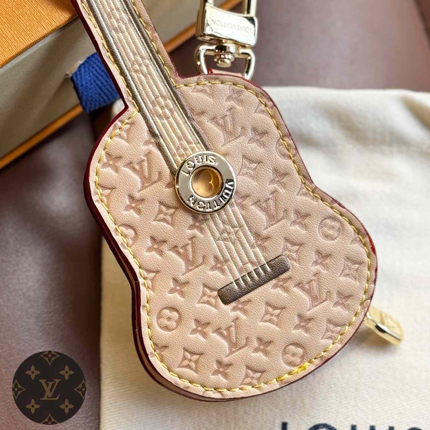 Louis Vuitton Guitar Pouch Bag Charm   M02032 - FashionPlug