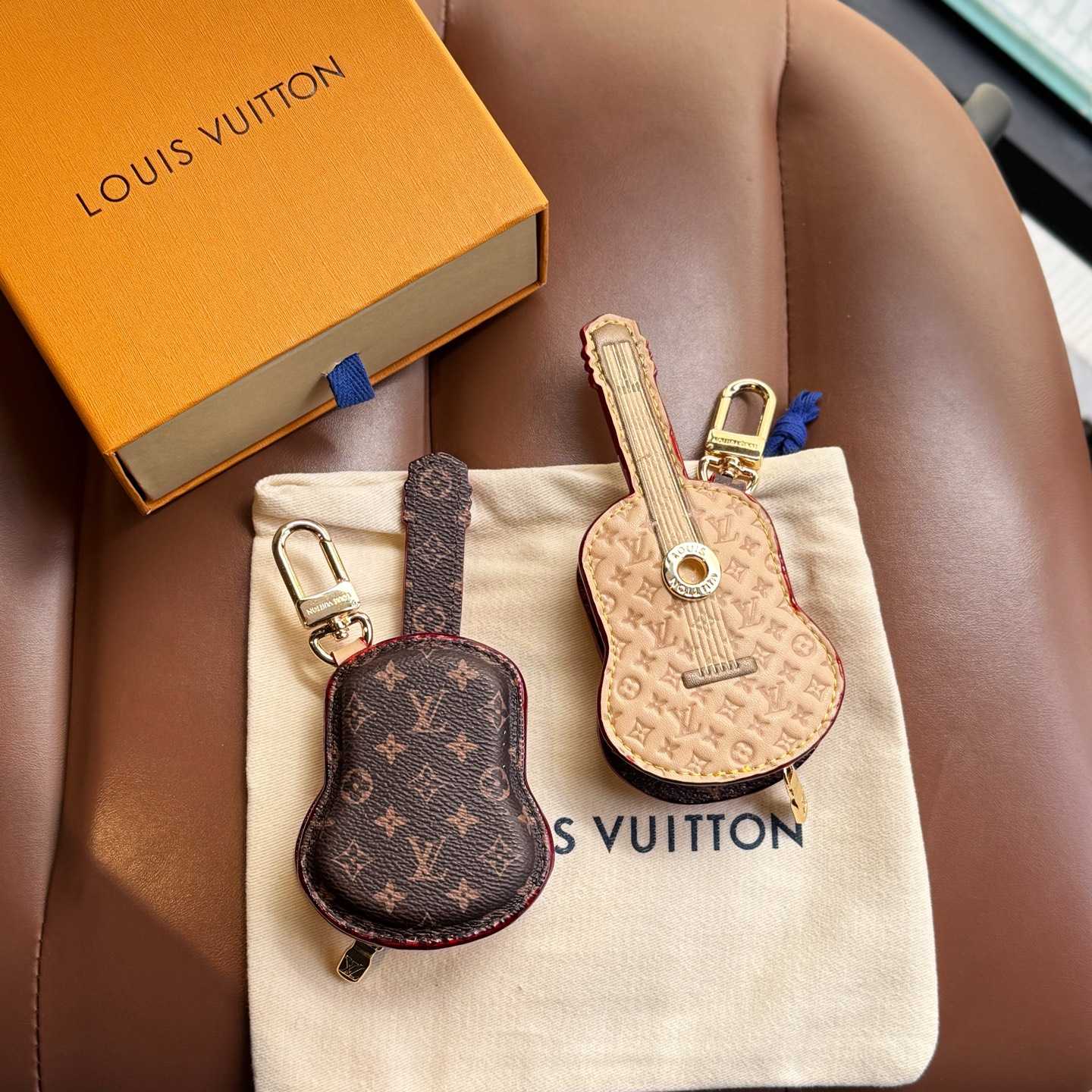 Louis Vuitton Guitar Pouch Bag Charm   M02032 - FashionPlug