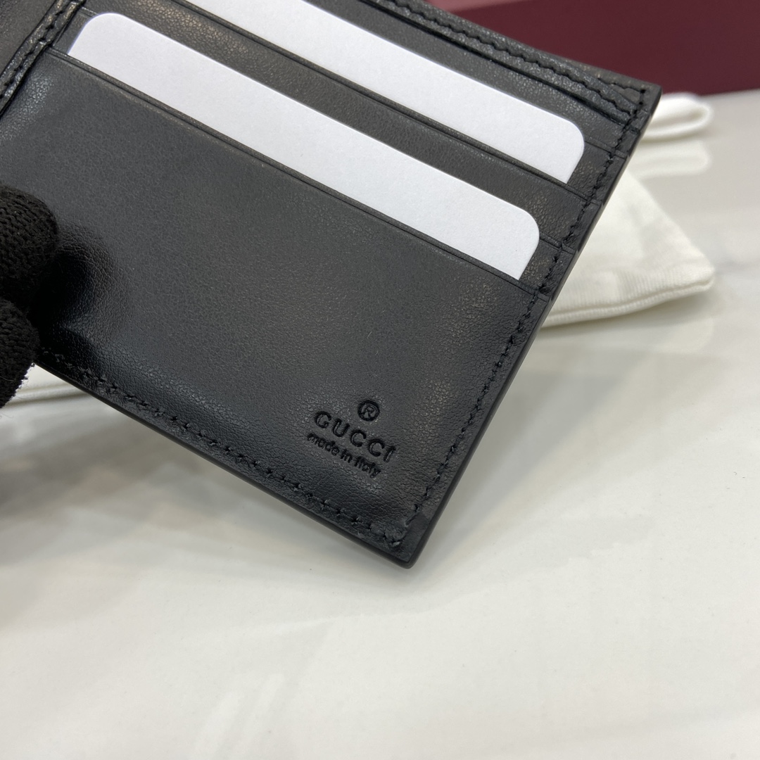 Gucci Maxi GG Bi-fold Wallet - FashionPlug