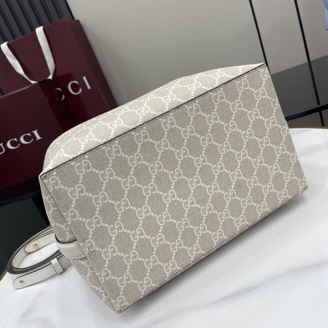 Gucci GG Emblem Small Shoulder Bag - FashionPlug