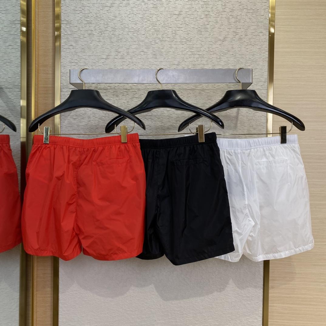Prada Re-Nylon Swim Trunks - FashionPlug