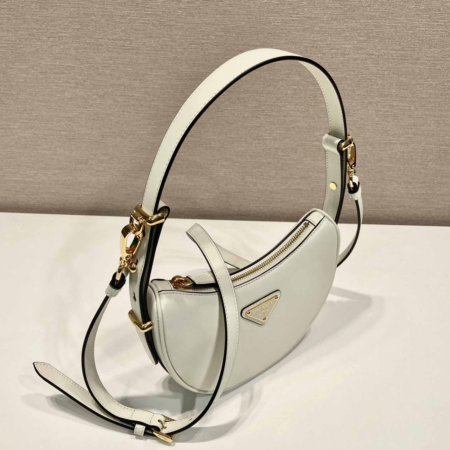 Prada Arqué Small Leather Shoulder Bag - FashionPlug