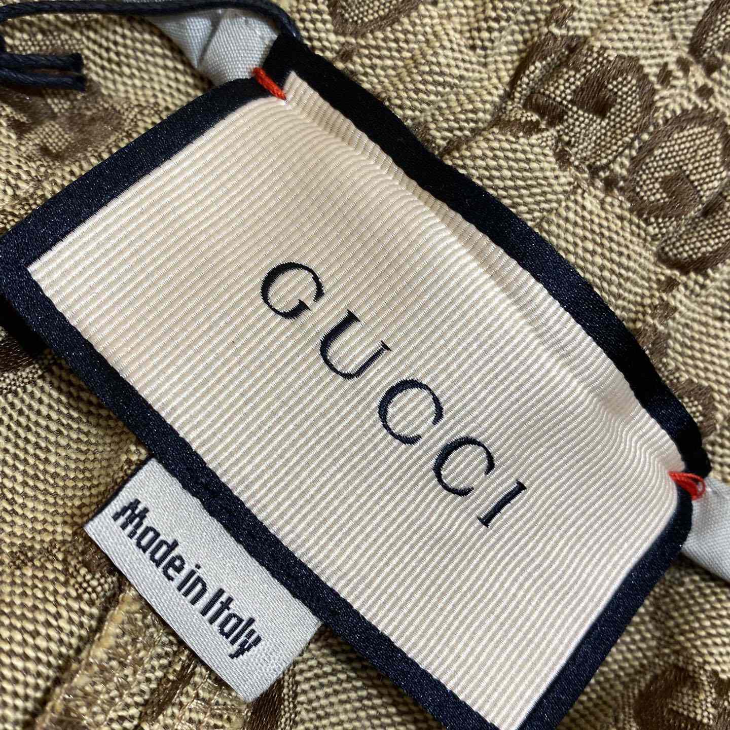 Gucci GG Supreme Shorts - FashionPlug