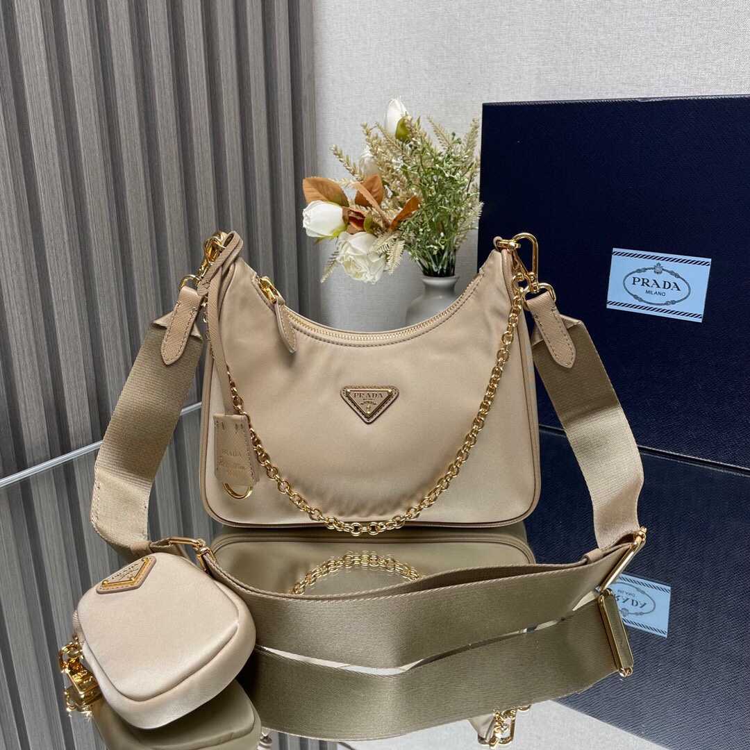Prada Re-Edition 2005 Re-Nylon And Saffiano Leather Bag With Charm - FashionPlug