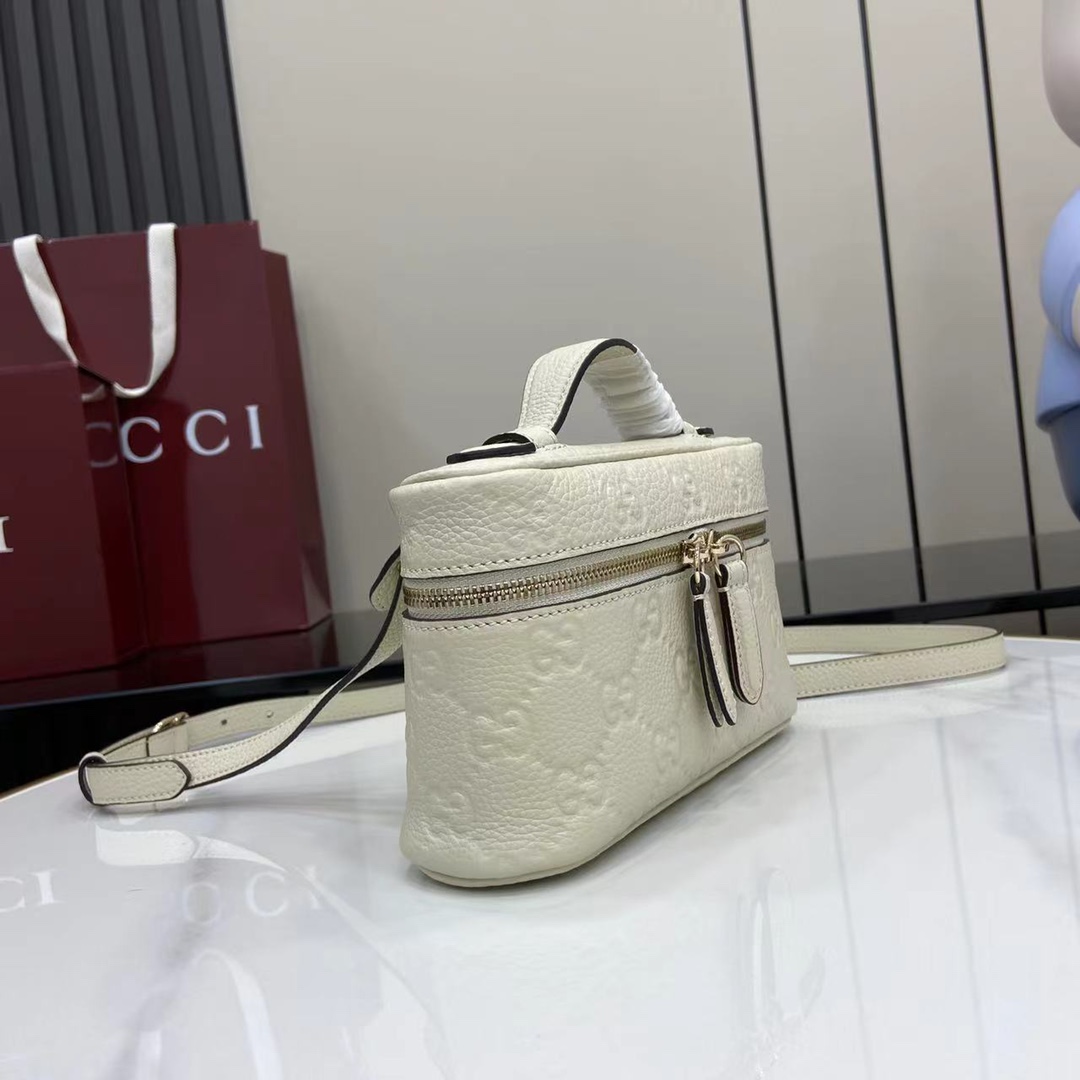 Gucci GG Emblem Small Bag - FashionPlug