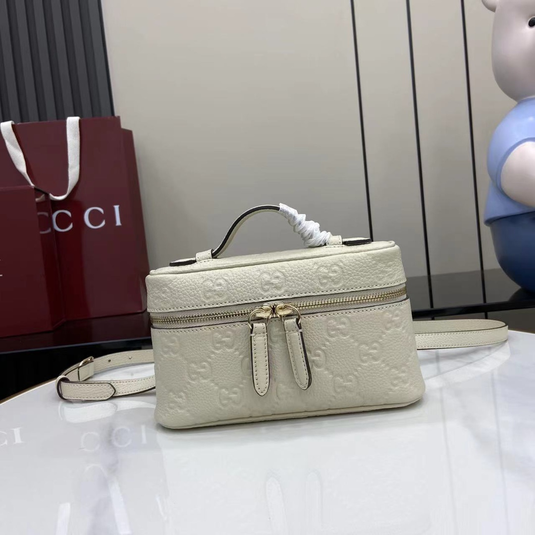 Gucci GG Emblem Small Bag - FashionPlug