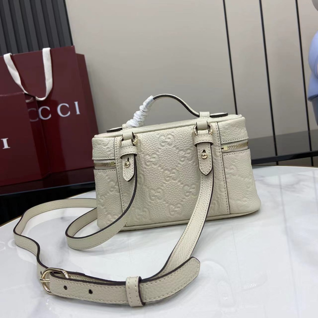 Gucci GG Emblem Small Bag - FashionPlug