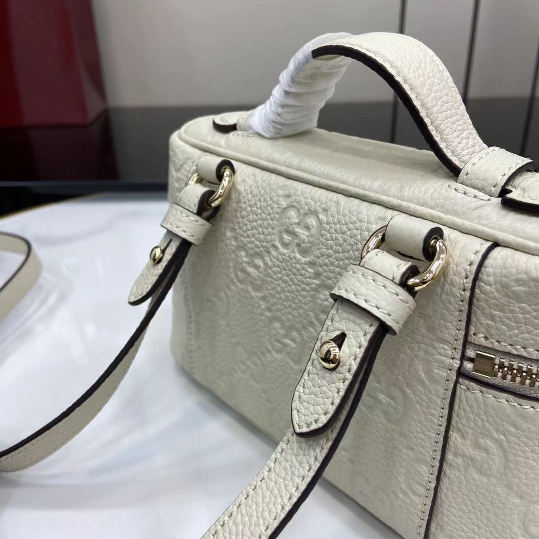 Gucci GG Emblem Small Bag - FashionPlug