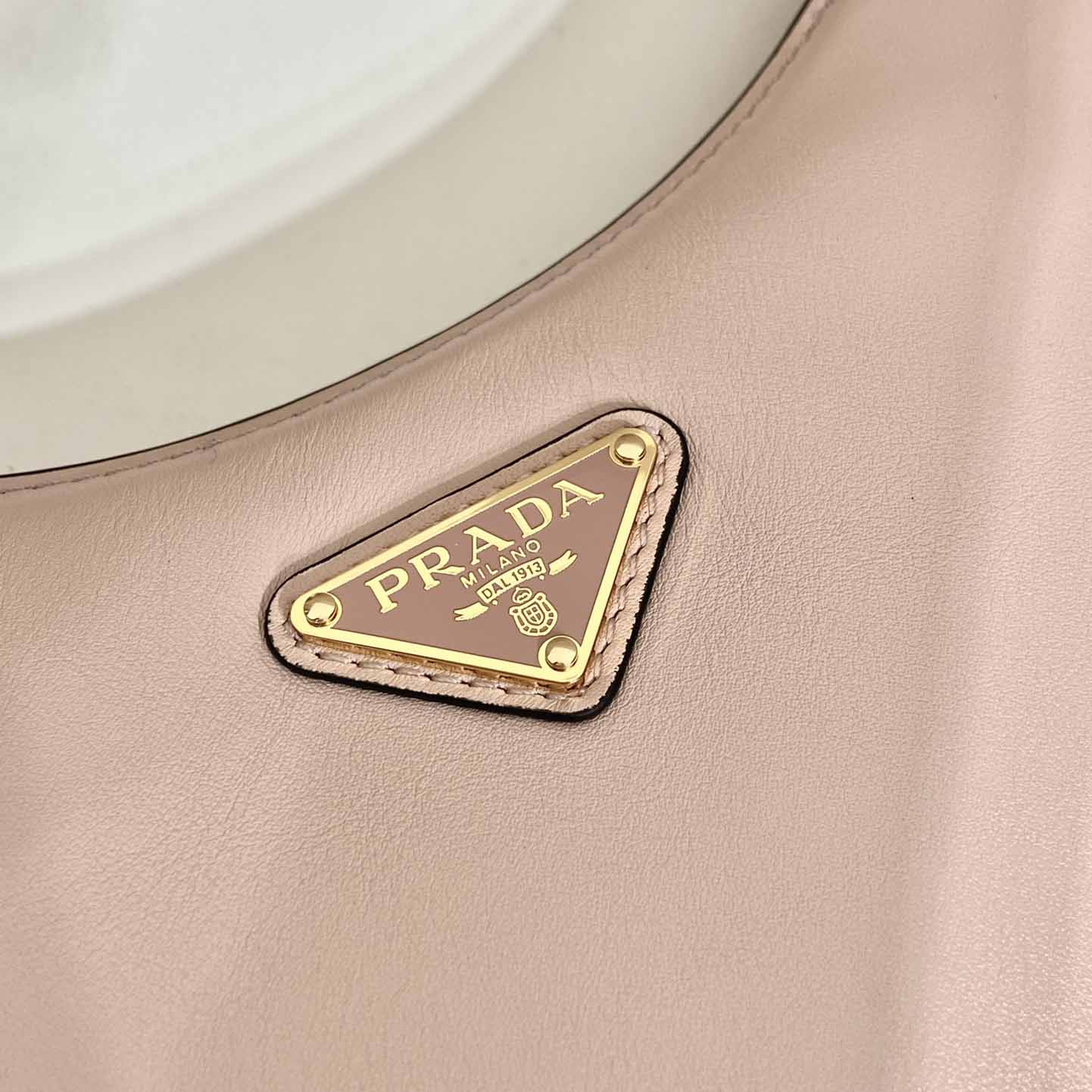 Prada Arqué Small Leather Shoulder Bag - FashionPlug