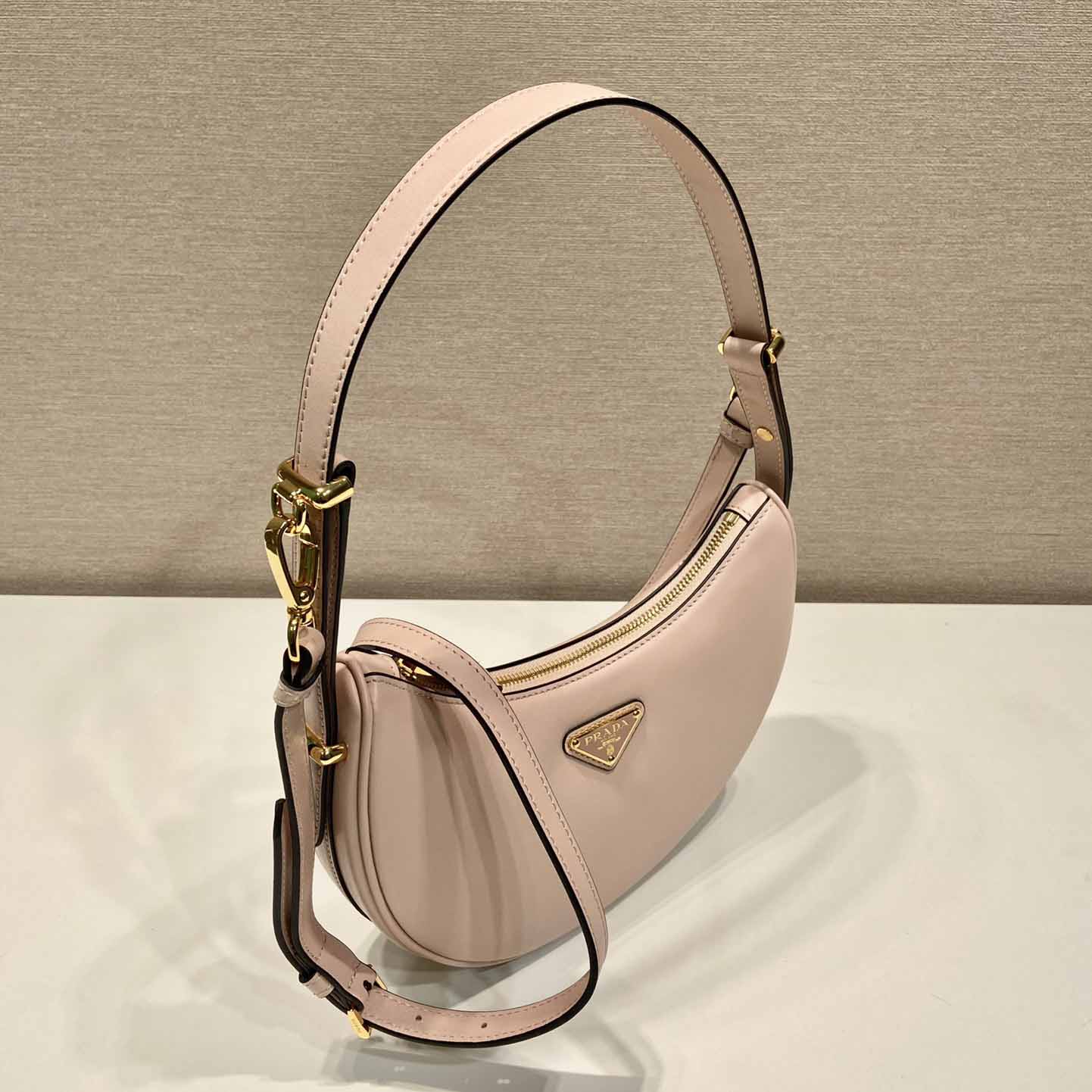 Prada Arqué Small Leather Shoulder Bag - FashionPlug
