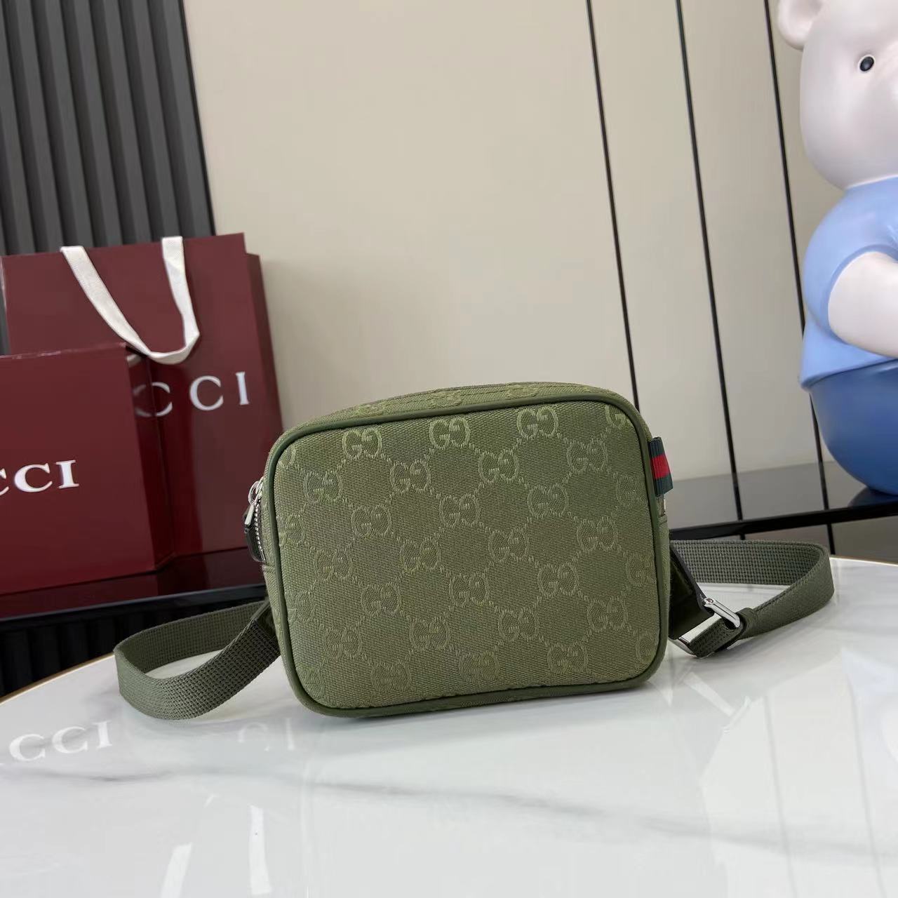 Gucci GG Canvas Mini Bag - FashionPlug