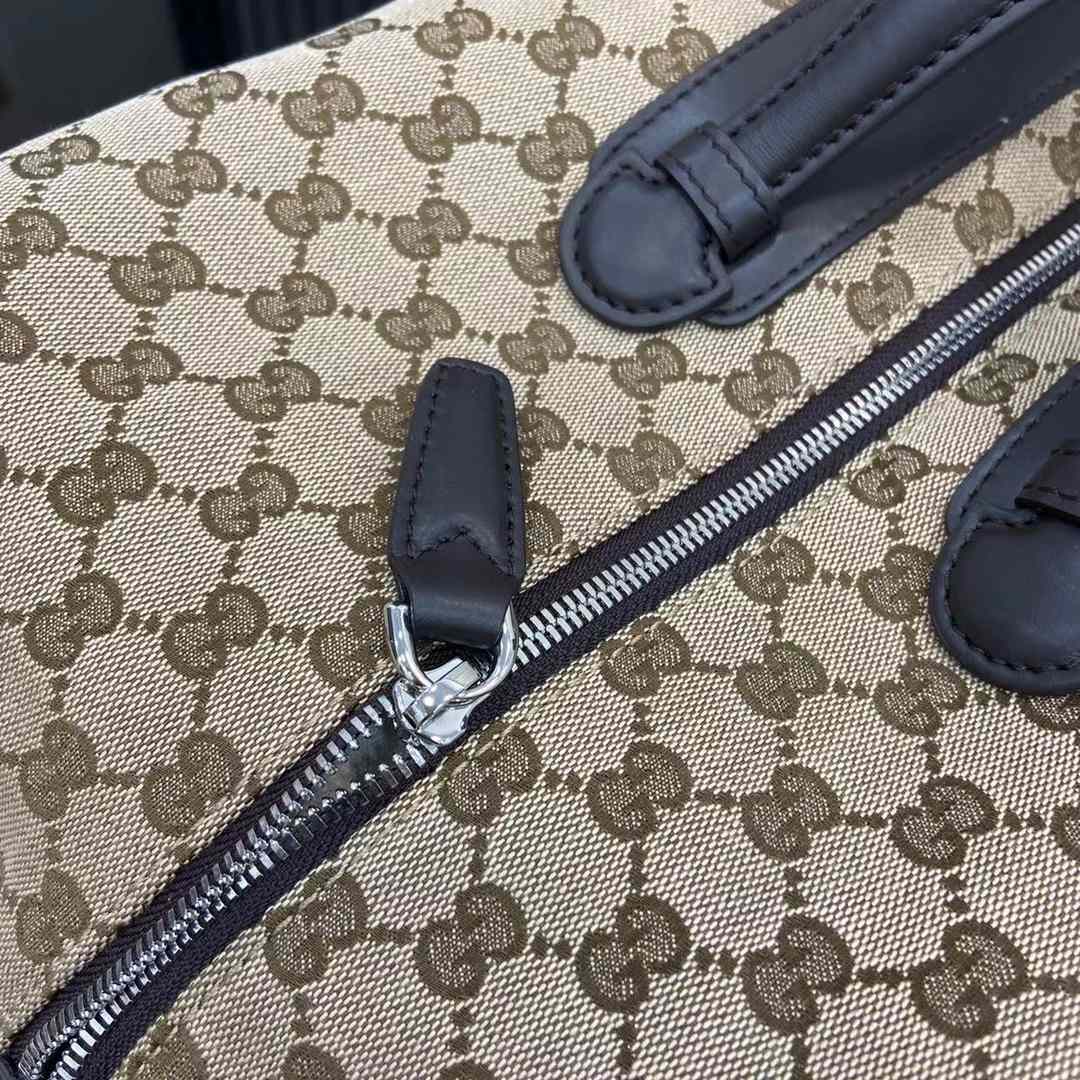 Gucci GG Canvas Medium Duffle Bag - FashionPlug