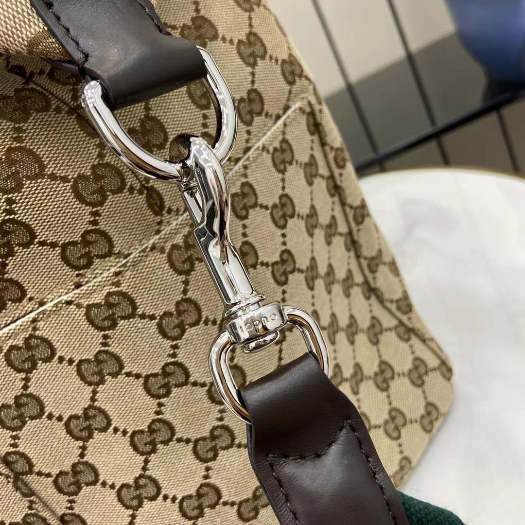 Gucci GG Canvas Medium Duffle Bag - FashionPlug