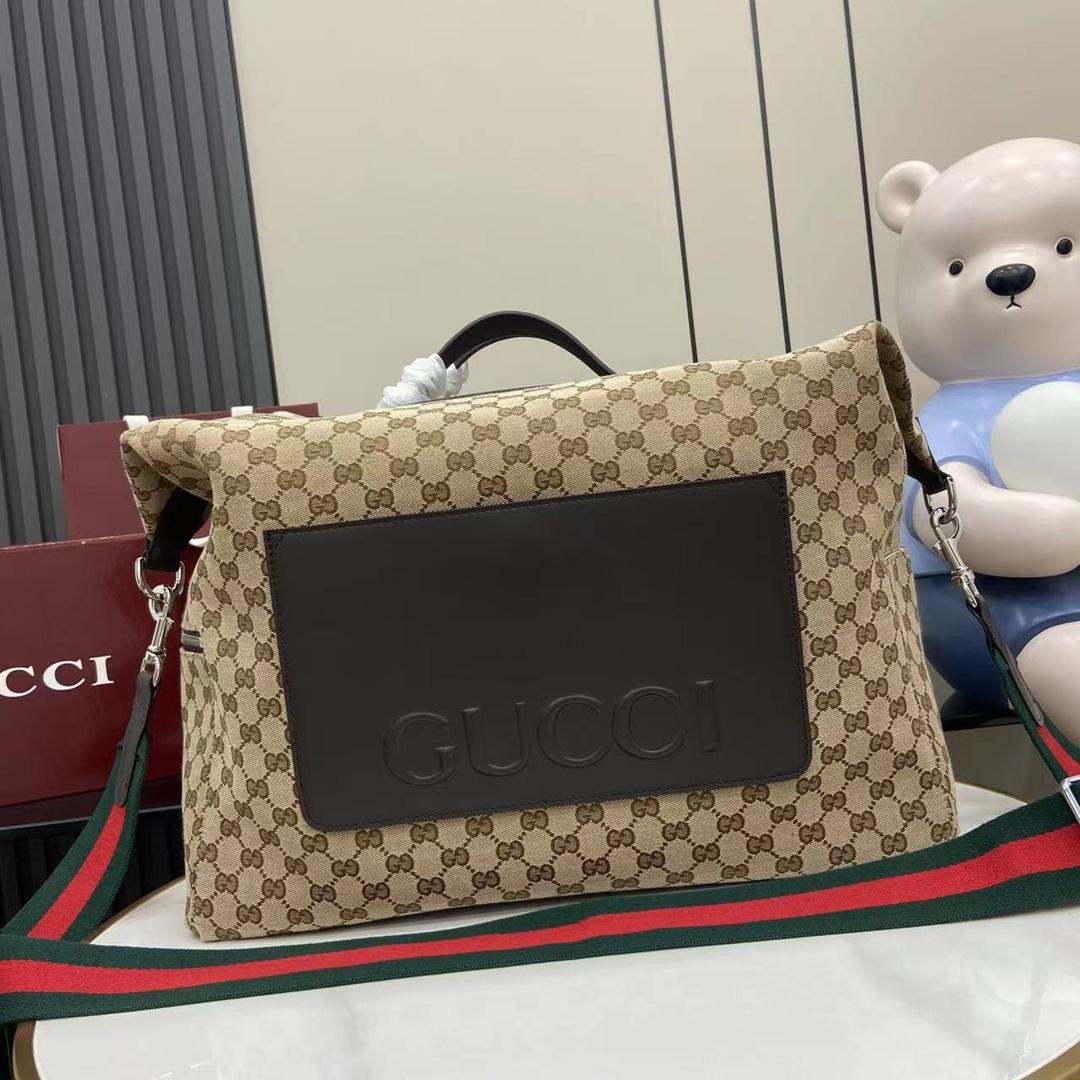 Gucci GG Canvas Medium Duffle Bag - FashionPlug
