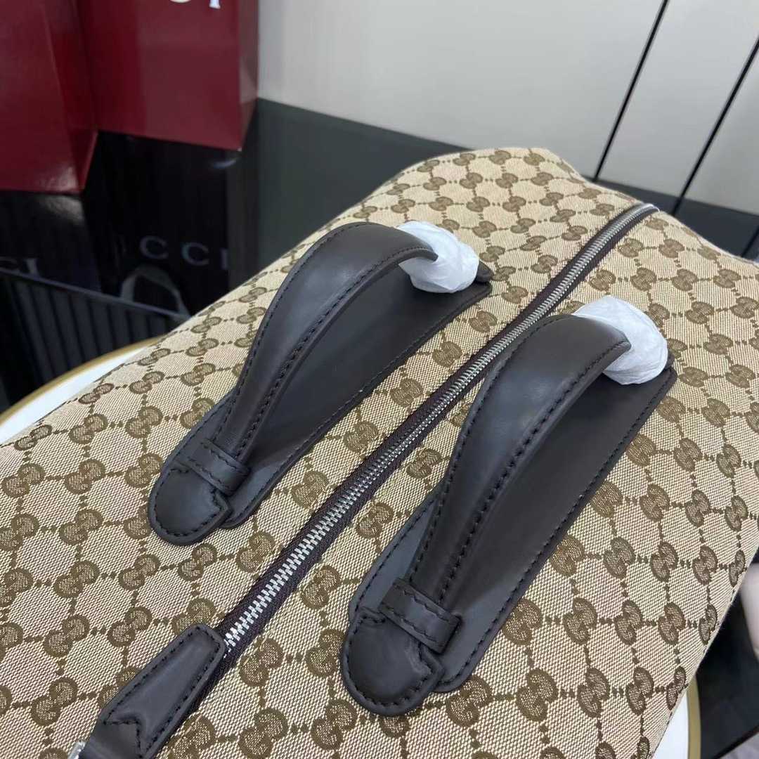 Gucci GG Canvas Medium Duffle Bag - FashionPlug