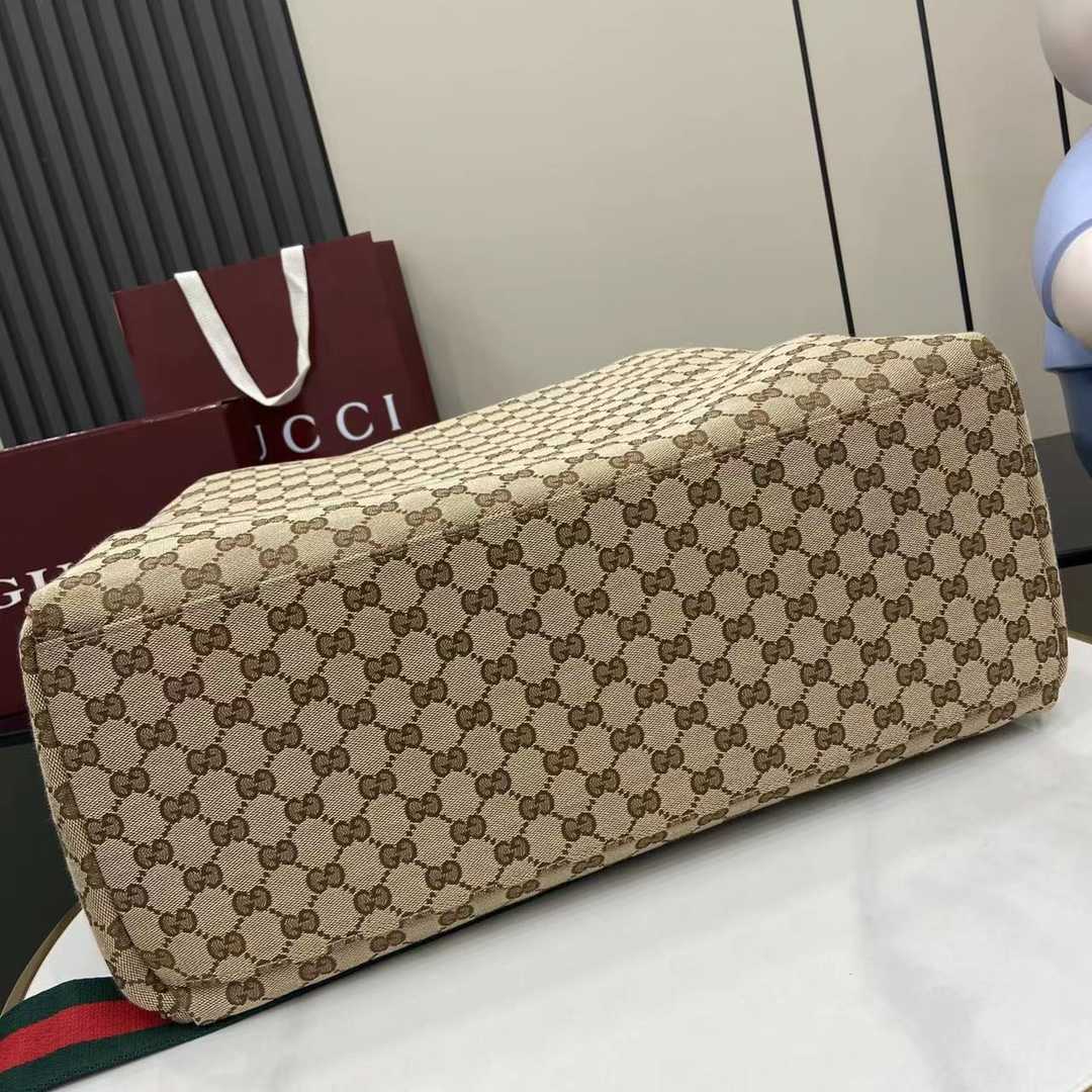 Gucci GG Canvas Medium Duffle Bag - FashionPlug