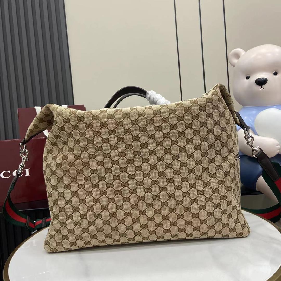 Gucci GG Canvas Medium Duffle Bag - FashionPlug