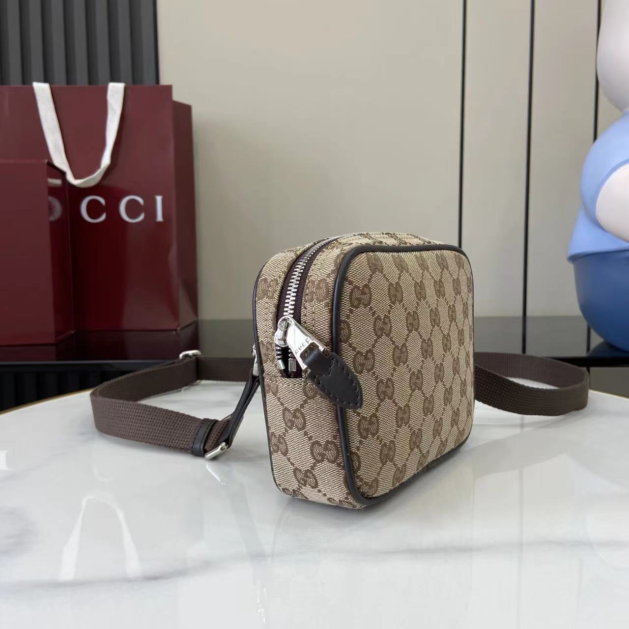Gucci GG Canvas Mini Bag - FashionPlug