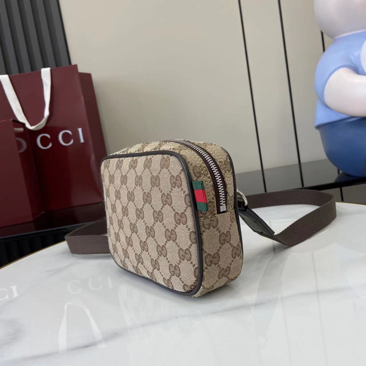 Gucci GG Canvas Mini Bag - FashionPlug
