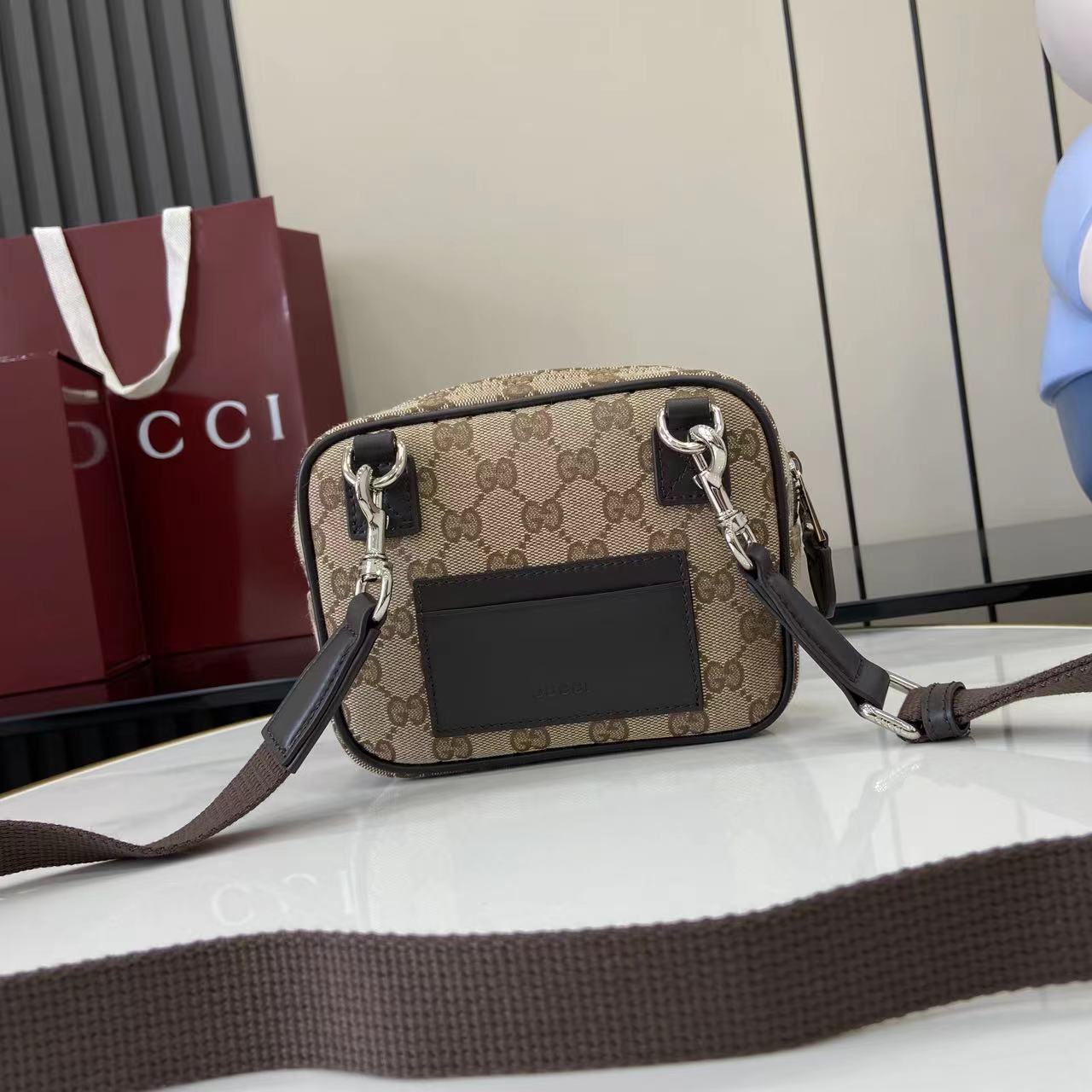 Gucci GG Canvas Mini Bag - FashionPlug